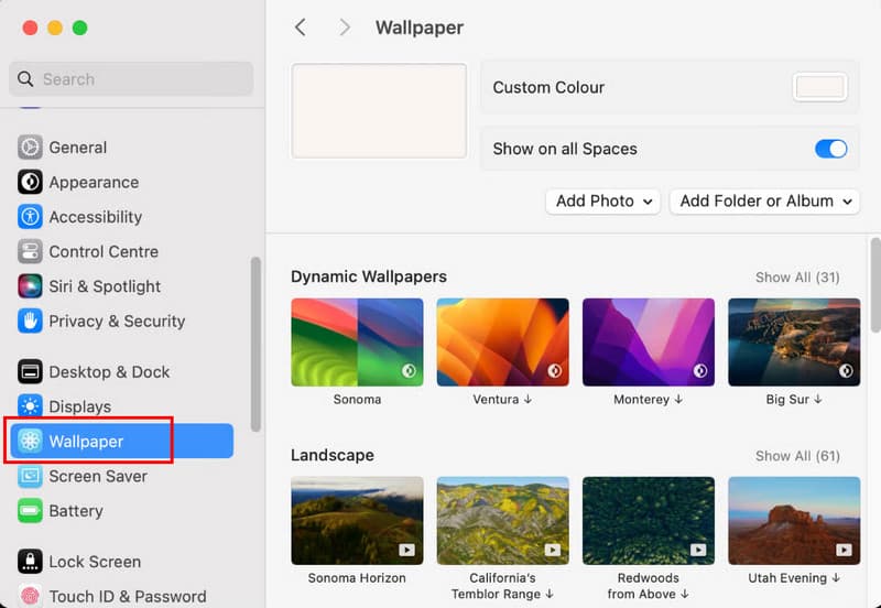 Auf „Hintergrundbild“ in den Systemeinstellungen klicken